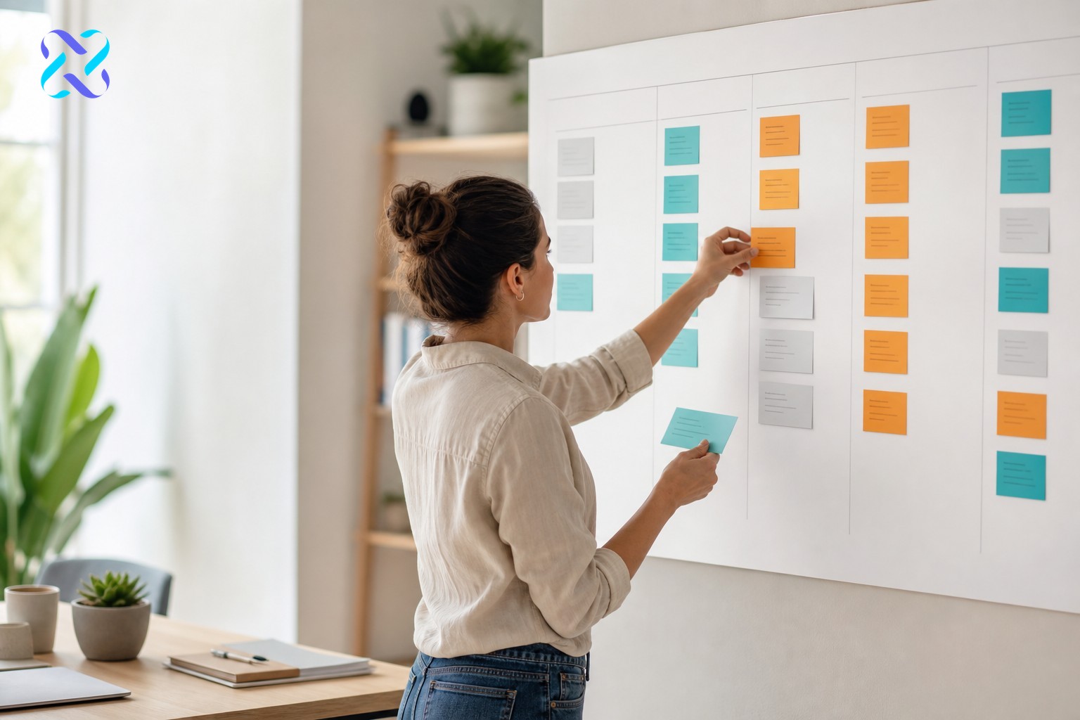 Content strategist organising keyword-mapped content plan cards on a planning board for SEO strategy